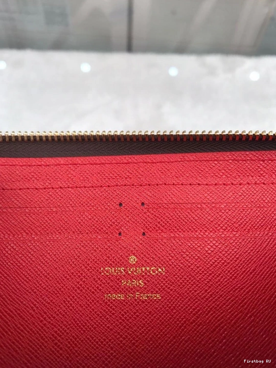 First bag VUITTON ZIPPY LOUIS 0717